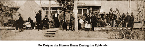 Soldiers, Hostess House Staff, and Visitors Congregate Outside the Front of the Houst House During the Flu Epidemic.