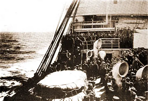 Daily Inspection on USS Mercury. Captain Brinser, USN, and Commanding Officer of Troops Coming down Ladder.