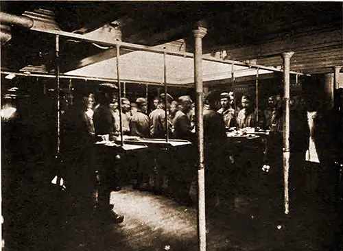 Troops at Mess on Swinging Tables.