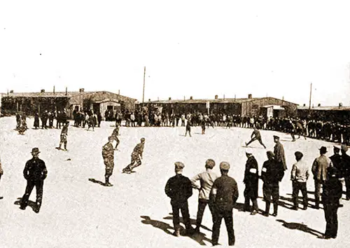 American Baseball Game with Russian Spectators at a German POW Camp.