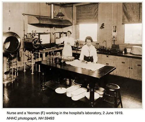 Nurse and a Yeoman (f.) Working in the Hospital’s Laboratory, 2 June 1919.