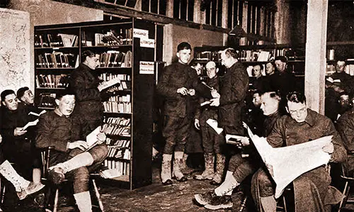 Browsing in the Alcoves of the A. L. A. Library at Camp Upton.