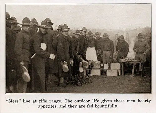 "Mess" line at rifle range. The outdoor life gives these men hearty appetites, and they are fed bountifully.
