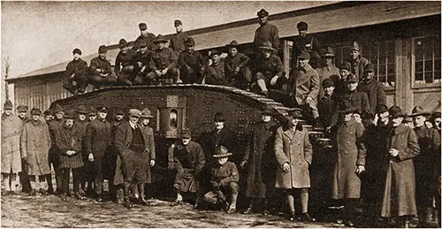 Capt. Haig and a Group in Front of the Tank "Britannia."