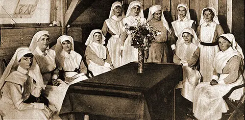 American Red Cross Nurses in the Living Room of Their Portable Hut Behind the Belgian Lines.