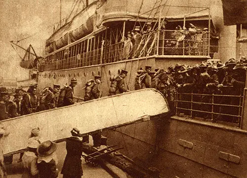 U. S. Marines Going Aboard Passenger Steamer Whose Spare Accommodations Have Been Chartered by the Government.