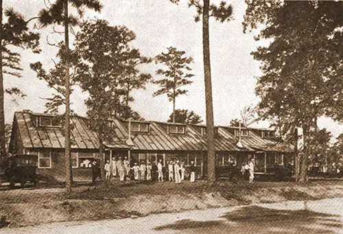 YMCA Hut. Each Camp and Training Station Has From Four to Fifteen of These Buildings, and Every Camp of Importance Also Has a Large Auditorium.