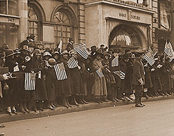 Crowds waiting for the parade of the famous 369th [African American] Infantry, formerly 15th New York regulars, New York City. National Archives & Records Administration ARC ID # 533517.