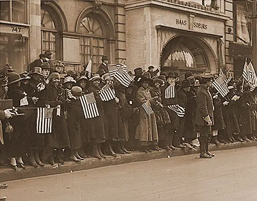 Crowds waiting for the parade of the famous 369th [African American] Infantry, formerly 15th New York regulars, New York City. National Archives & Records Administration ARC ID # 533517.