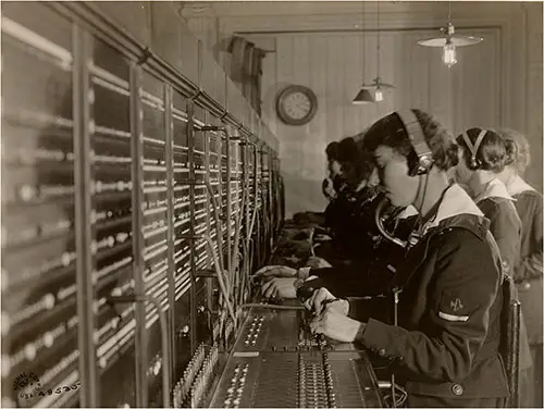 Female Operators Staff the Telephone Exchange at Elysées Palace Hotel, Paris, Seine, France.
