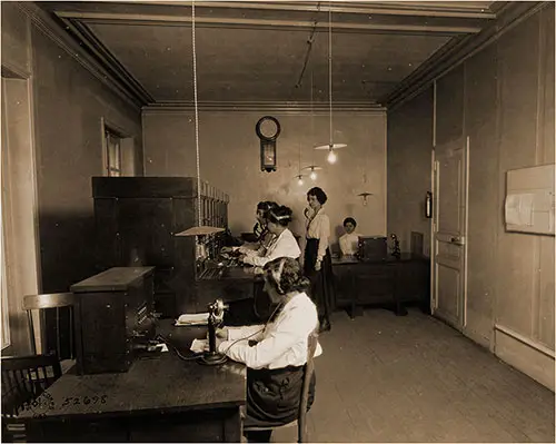 Female Telephone Operators Staff the Telephone Switchboard at Signal Corps. Base Section #1. St. Nazaire, Loire-Inferieure, France.