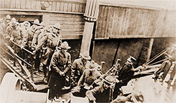 American Expeditionary Force Troops Disembarking from the Transport Ship President Lincoln at Hoboken, c 1918.