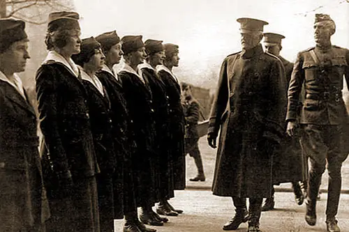 Gen. John Pershing, Commander of the American Expeditionary Forces in France during World War I, Reviews American Female Telephone Operators.