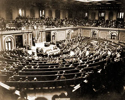 United States President Woodrow Wilson Announces the End of World War I and Reads the German Armistice's Terms to Congress in Joint Session and, in Washington, DC, on 11 November 1918.