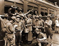 Canteen Workers from the American Red Cross Supply Soldiers with Snacks and Sundry Items at the Union Station, St. Paul, Minnesota, c1917.